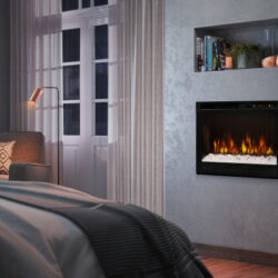 DIMPLEX XHD26G ELECTRIC FIREPLACE INSERT IN BEDROOM WALL