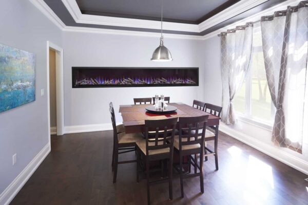 NAPOLEON ALLURAVISION NEFL100CHD WITH LOGS IN DINING ROOM