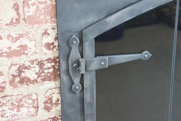 STOLL FORGED IRON FIREPLACE DOOR HINGE DETAIL